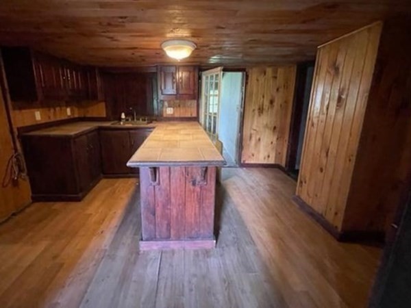 79 Station Road Barre, MA 01005 - Photo 5 of 13 an empty room with wooden floor and windows