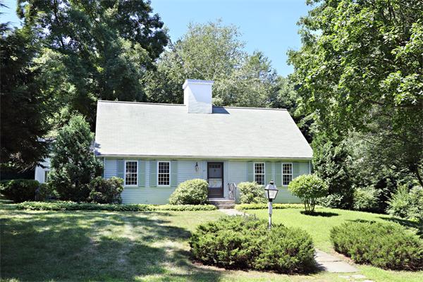 85 Standish Road Wellesley, MA 02481 - Photo 1 of 5 a front view of a house with a yard