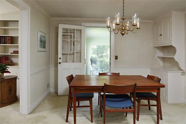 85 Standish Road Wellesley, MA 02481 - Photo 3 of 5 a view of a dining room with furniture and chandelier