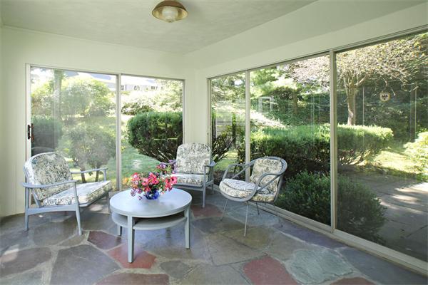 85 Standish Road Wellesley, MA 02481 - Photo 4 of 5 a outdoor dining space with patio furniture and garden view