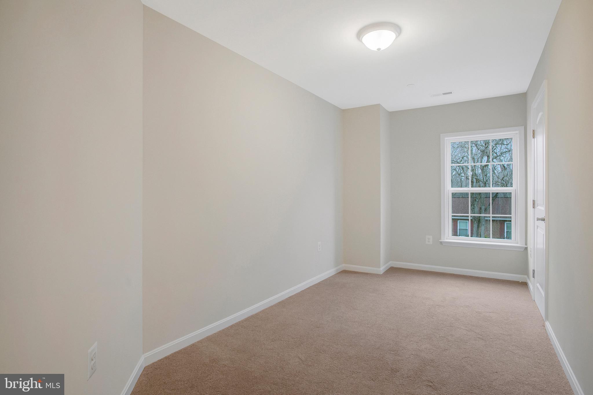 11541 Bootstrap Trail Lusby, MD 20657 - Photo 15 of 24 an empty room with a window
