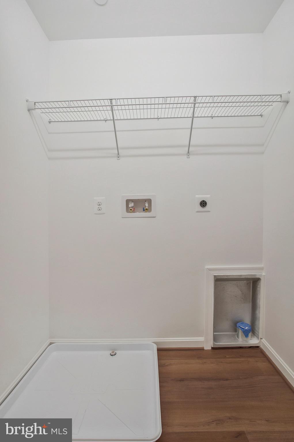 11541 Bootstrap Trail Lusby, MD 20657 - Photo 18 of 24 a view of a room with rack on the wall