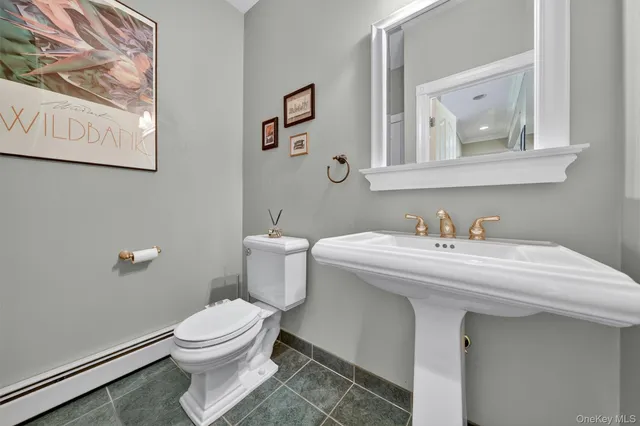 a bathroom with a sink and a toilet