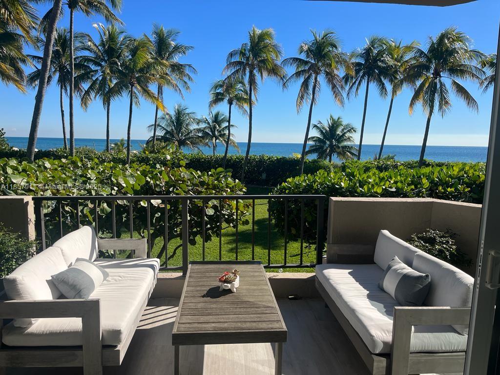 201 Crandon Boulevard, Unit 177 Key Biscayne, FL 33149 - Photo 5 of 24 a view of outdoor space yard and patio