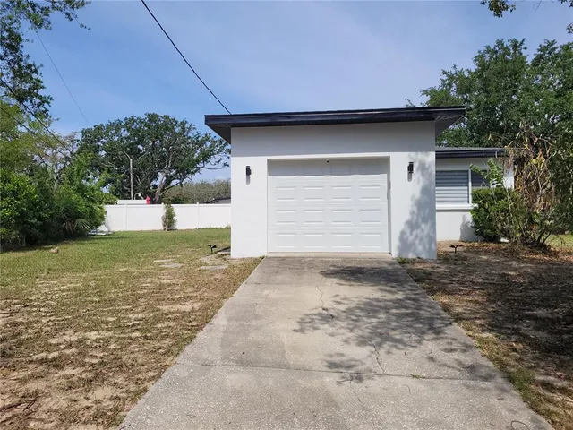 a house with yard in front of it
