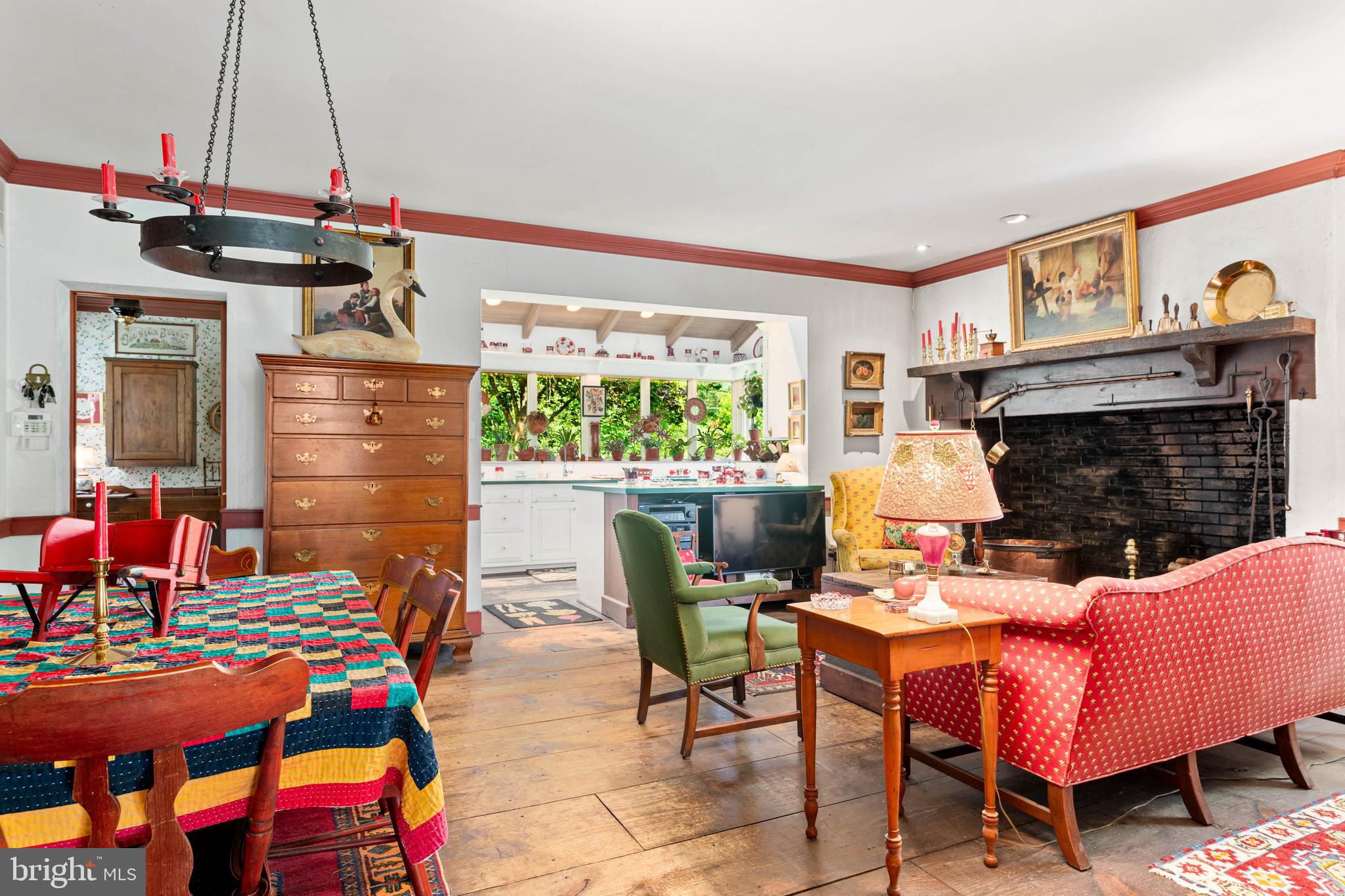 2070 Huntingdon Road Huntingdon Valley, PA 19006 - Photo 16 of 76 a living room with furniture a fireplace and a flat screen tv