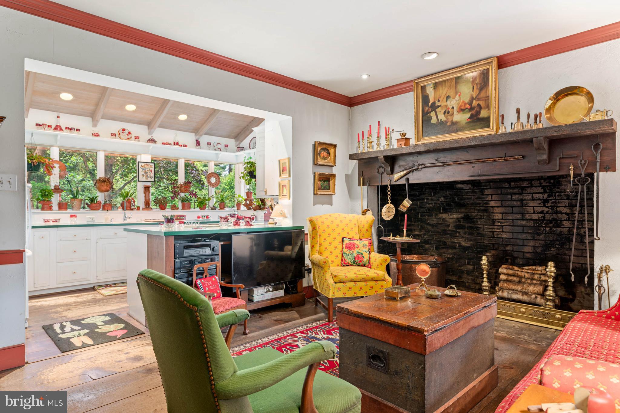 2070 Huntingdon Road Huntingdon Valley, PA 19006 - Photo 17 of 76 a living room with fireplace furniture and a large window