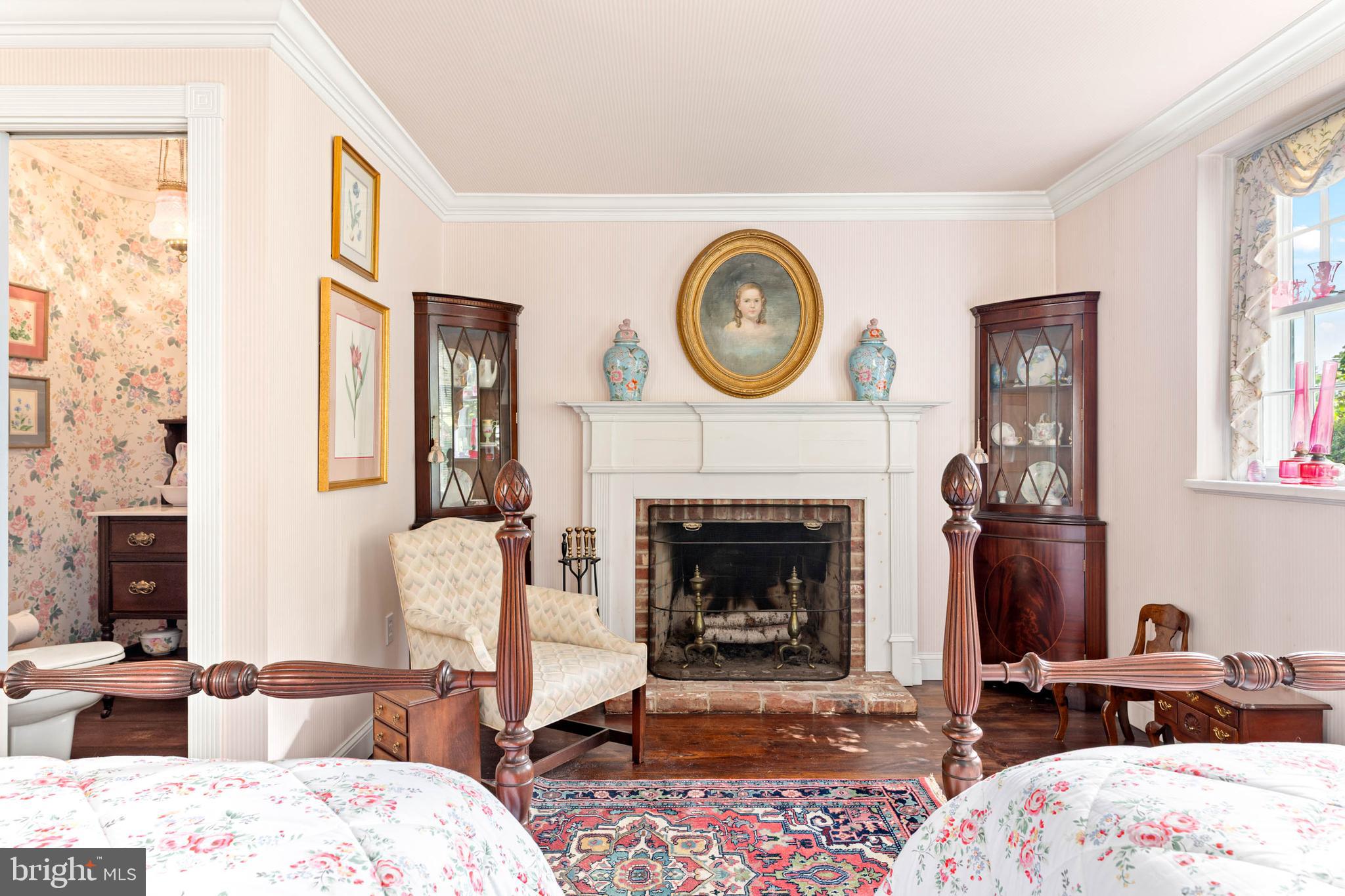 2070 Huntingdon Road Huntingdon Valley, PA 19006 - Photo 33 of 76 a living room with furniture and a fireplace