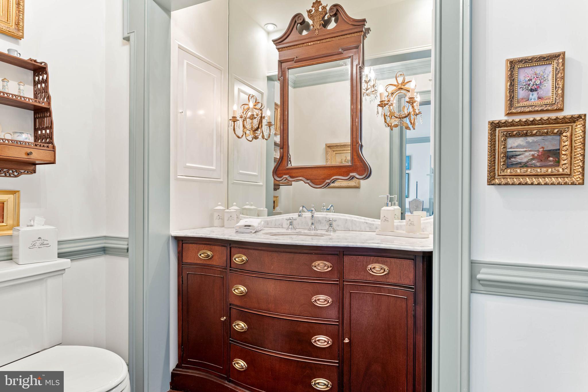 2070 Huntingdon Road Huntingdon Valley, PA 19006 - Photo 55 of 76 a bathroom with a granite countertop sink and a toilet