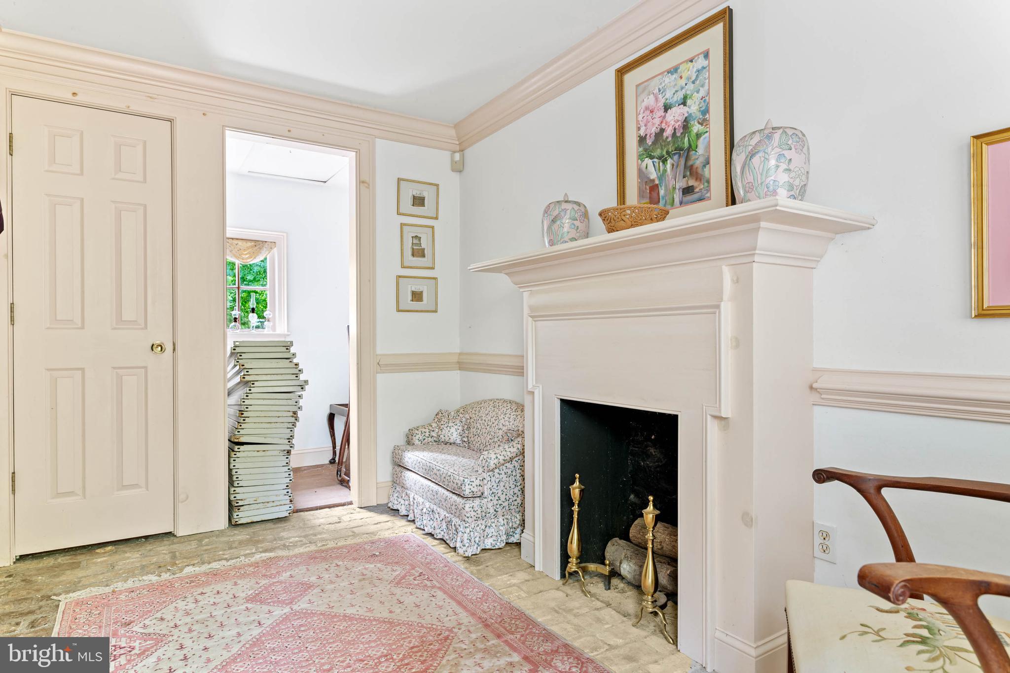 2070 Huntingdon Road Huntingdon Valley, PA 19006 - Photo 65 of 76 a living room with furniture and a fireplace