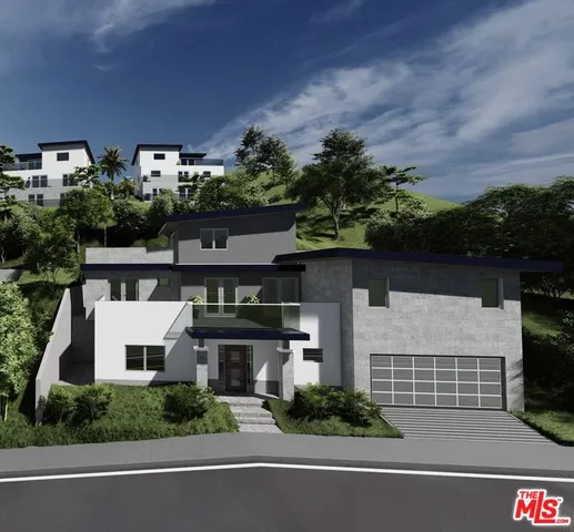 an aerial view of a house with a yard and potted plants