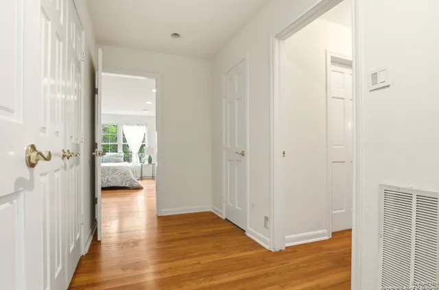 a view of a livingroom with wooden floor