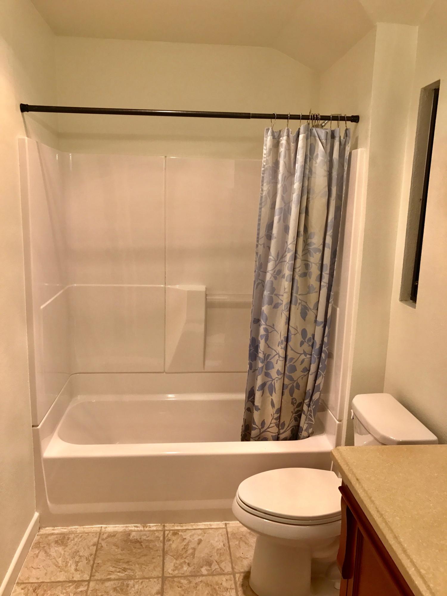 1815 Bath Street, Unit 1 Santa Barbara, CA 93101 - Photo 11 of 19 a bathroom with a toilet and a shower