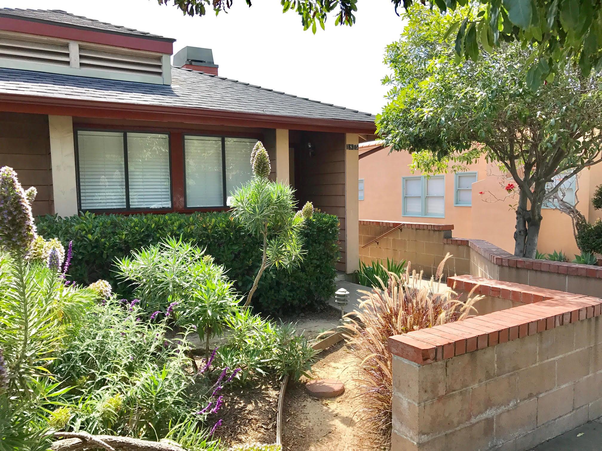 1815 Bath Street, Unit 1 Santa Barbara, CA 93101 - Photo 19 of 19 a front view of a house with garden