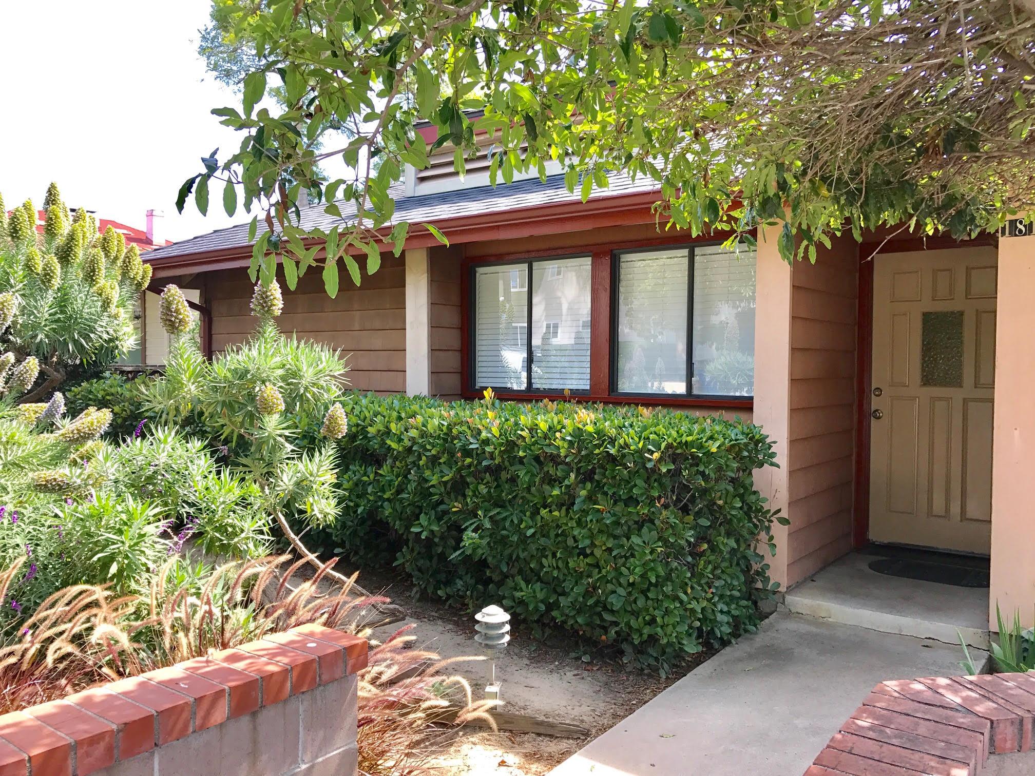 1815 Bath Street, Unit 1 Santa Barbara, CA 93101 - Photo 2 of 19 a front view of a house with garden