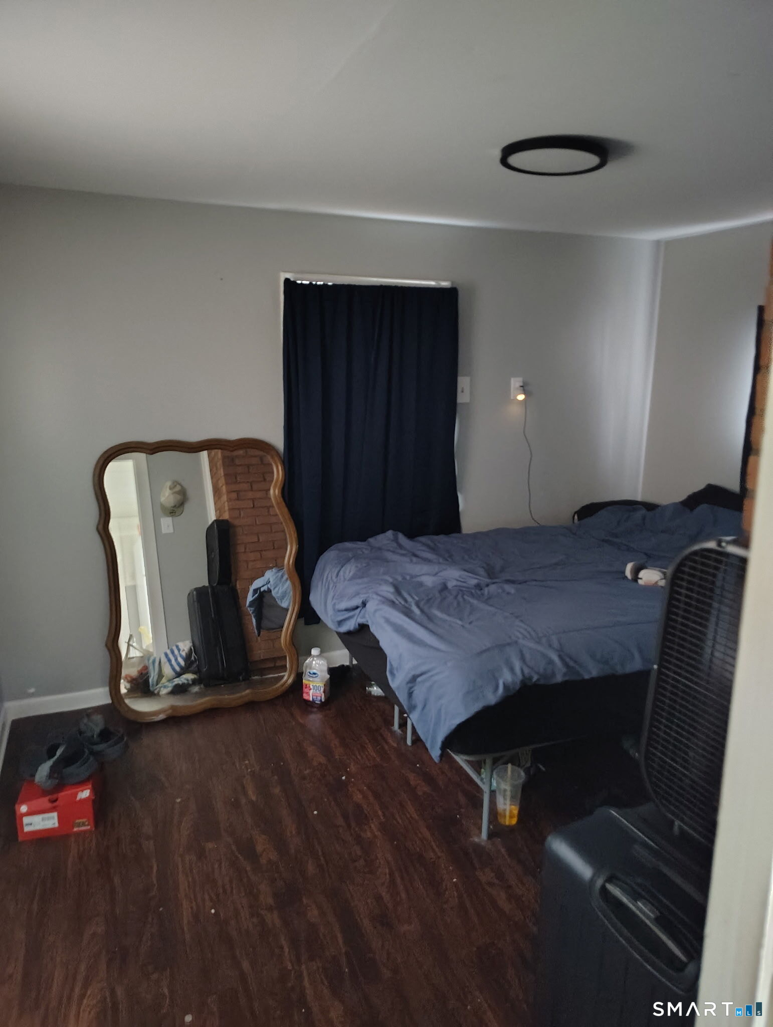 25 George Street Torrington, CT 06790 - Photo 31 of 34 a bedroom with a bed and a mirror