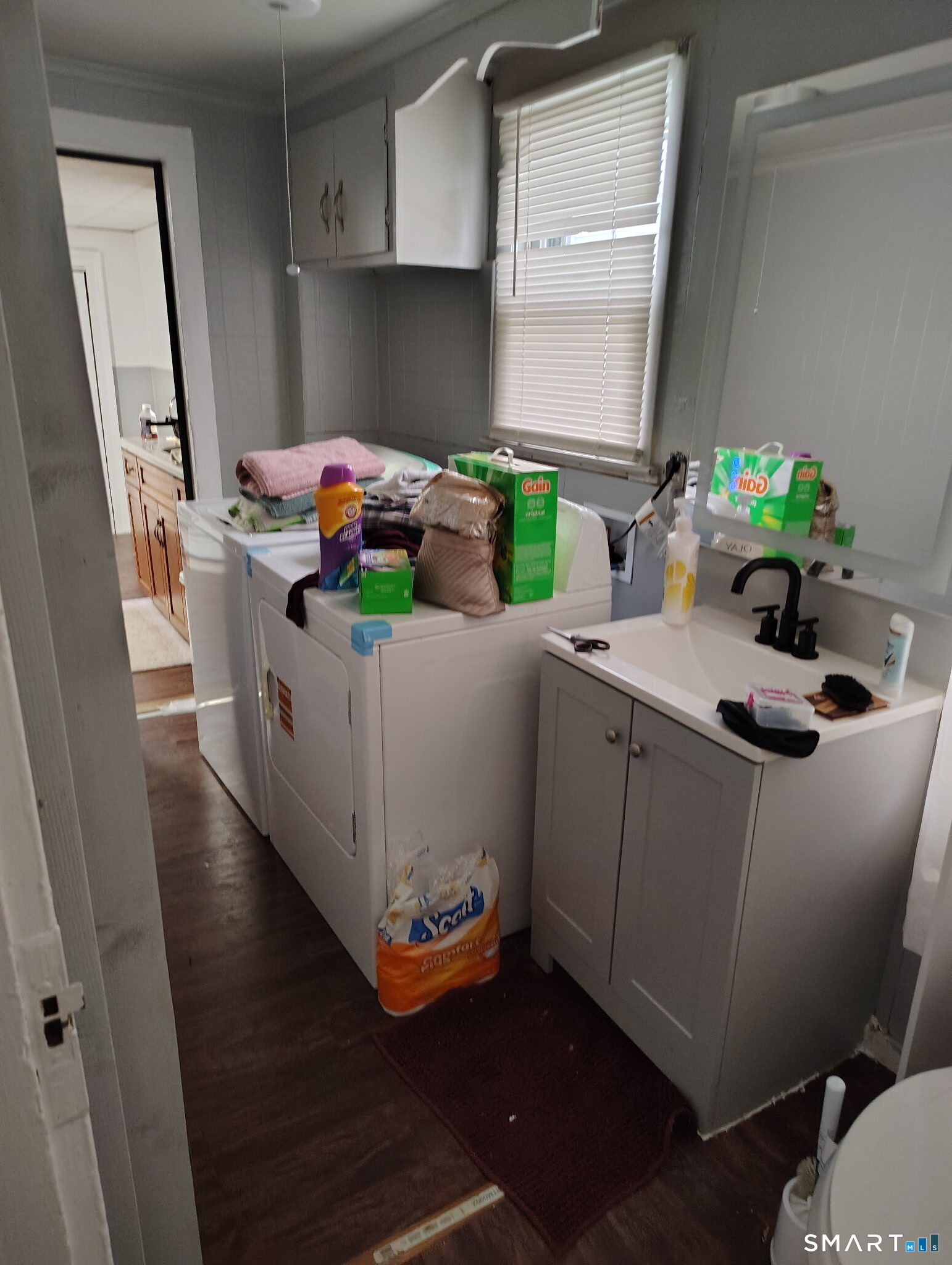 25 George Street Torrington, CT 06790 - Photo 6 of 34 a room with furniture and a potted plant
