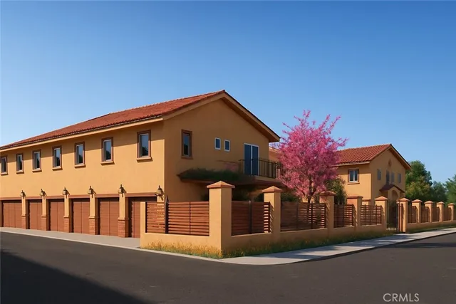 a front view of a house with yard