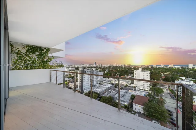 a view of a patio with couches chairs and a table and chairs