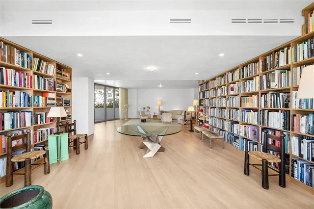 a bathroom with a granite countertop sink mirror bathtub and shower
