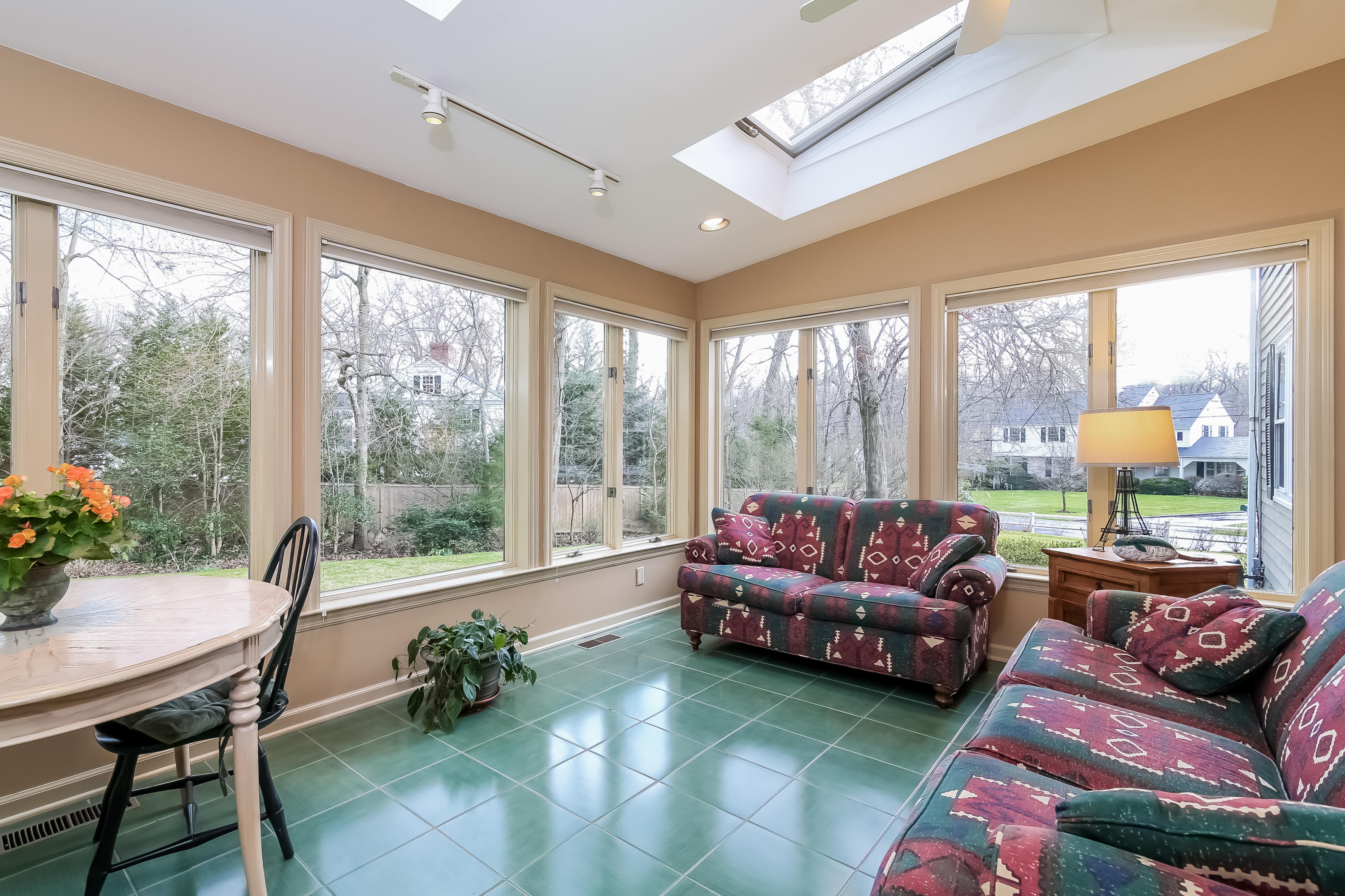 101 Colony Road Darien, CT 06820 - Photo 15 of 31 a living room with furniture and a potted plant