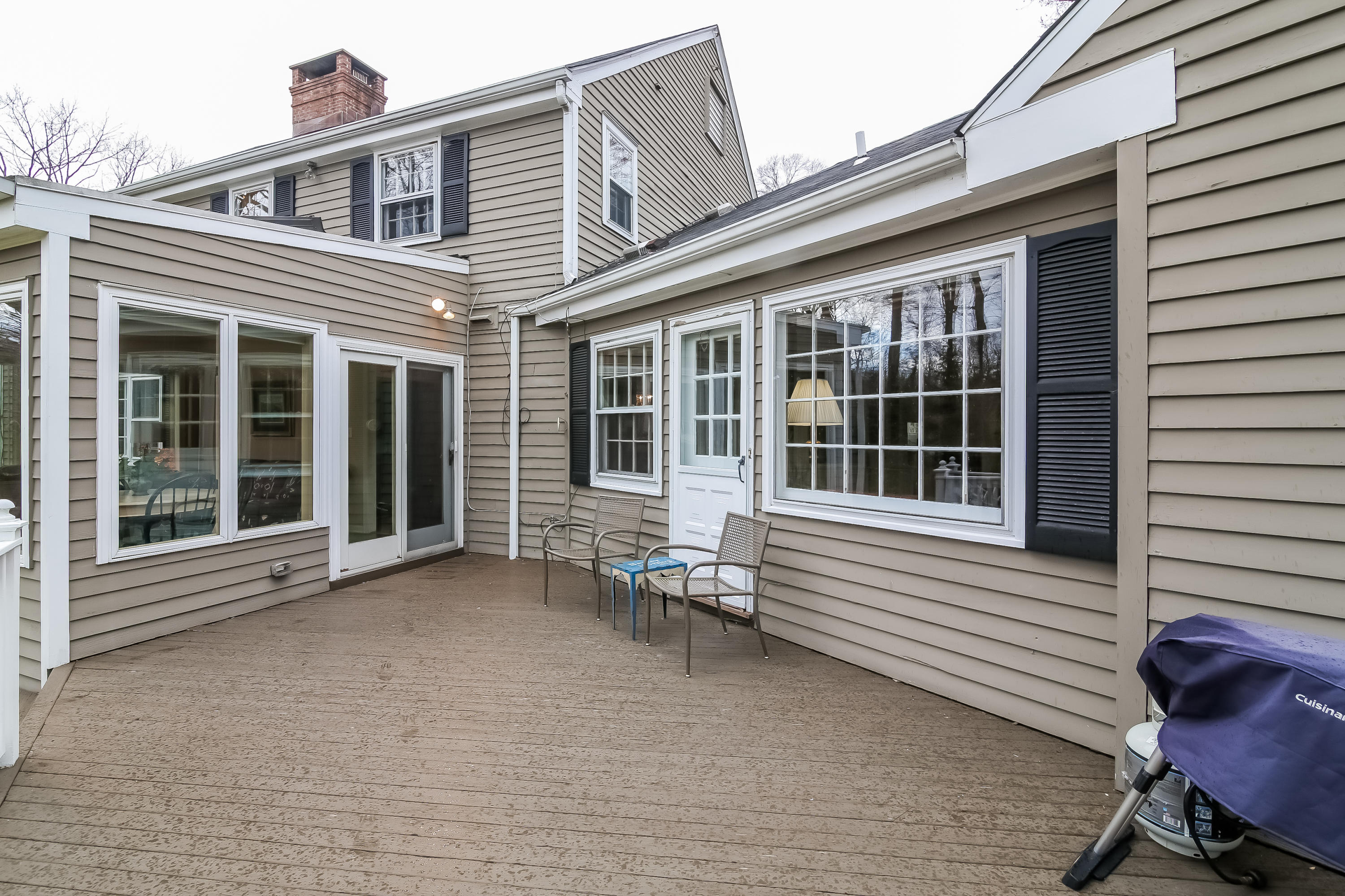 101 Colony Road Darien, CT 06820 - Photo 23 of 31 a view of a house with a chair and a window