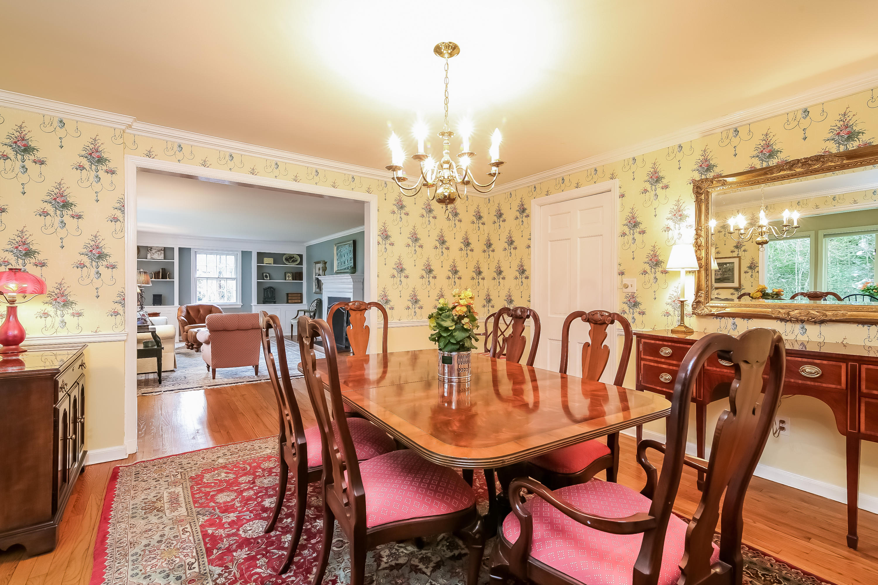101 Colony Road Darien, CT 06820 - Photo 6 of 31 a view of a dining room with furniture and wooden floor