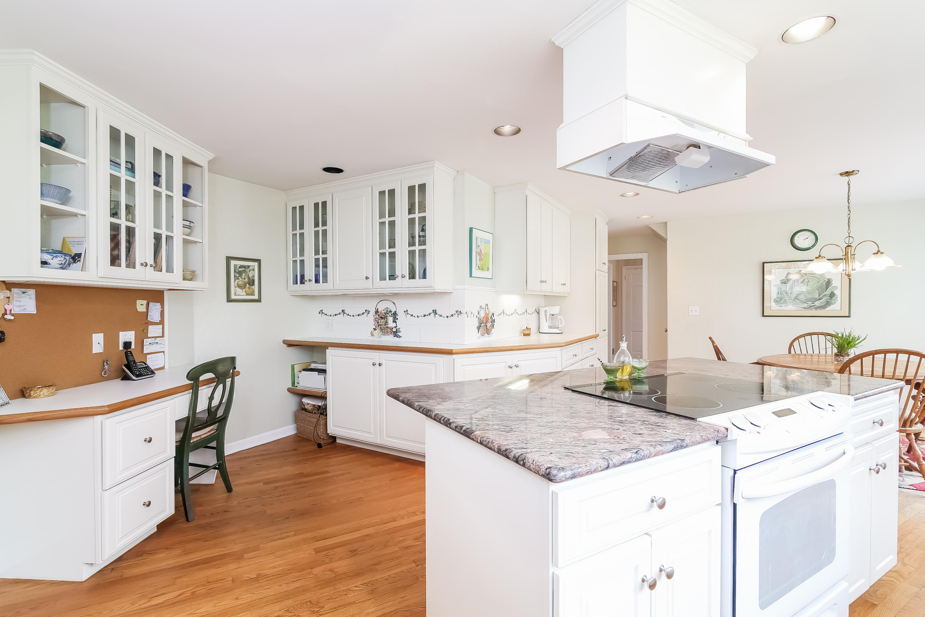 101 Colony Road Darien, CT 06820 - Photo 9 of 31 a kitchen with granite countertop a sink a stove and cabinets