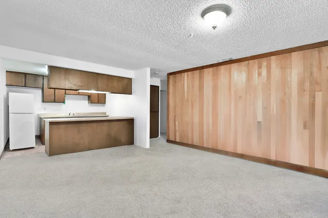 a view of a kitchen with a sink