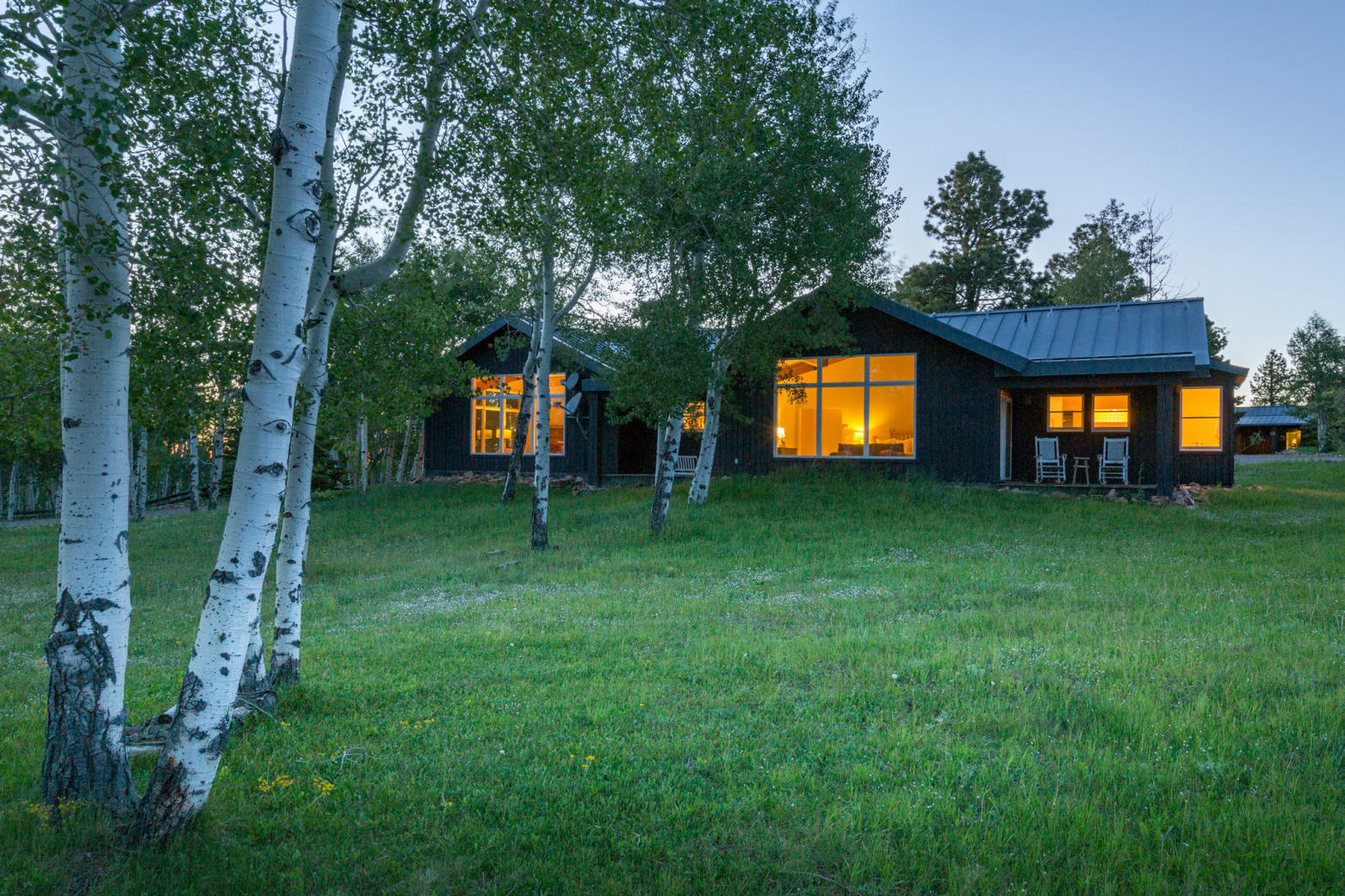 a swimming pool view with a garden