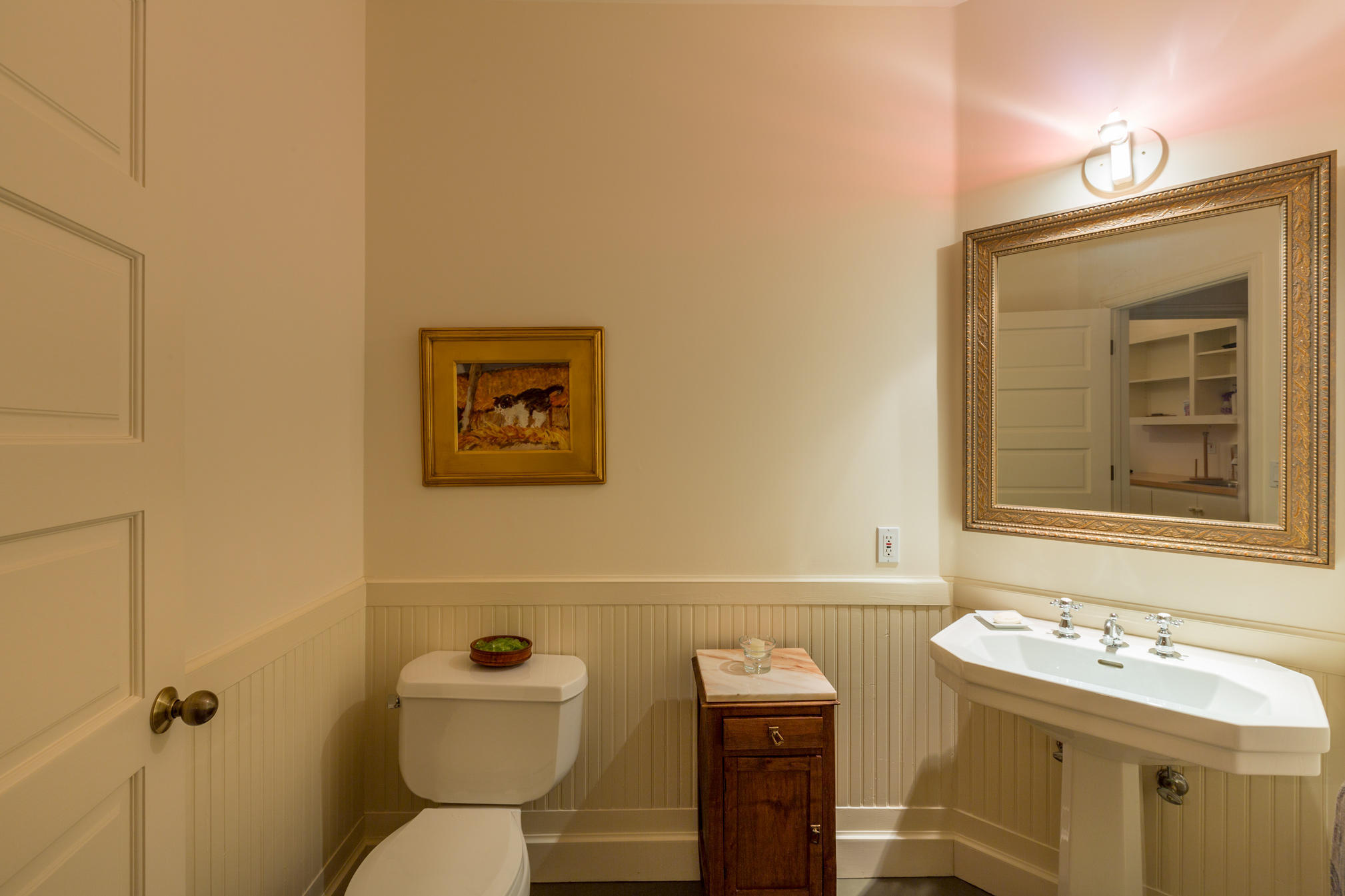 3289 Laughing Dog Road Placerville, CO 81430 - Photo 24 of 52 a bathroom with a toilet sink and mirror