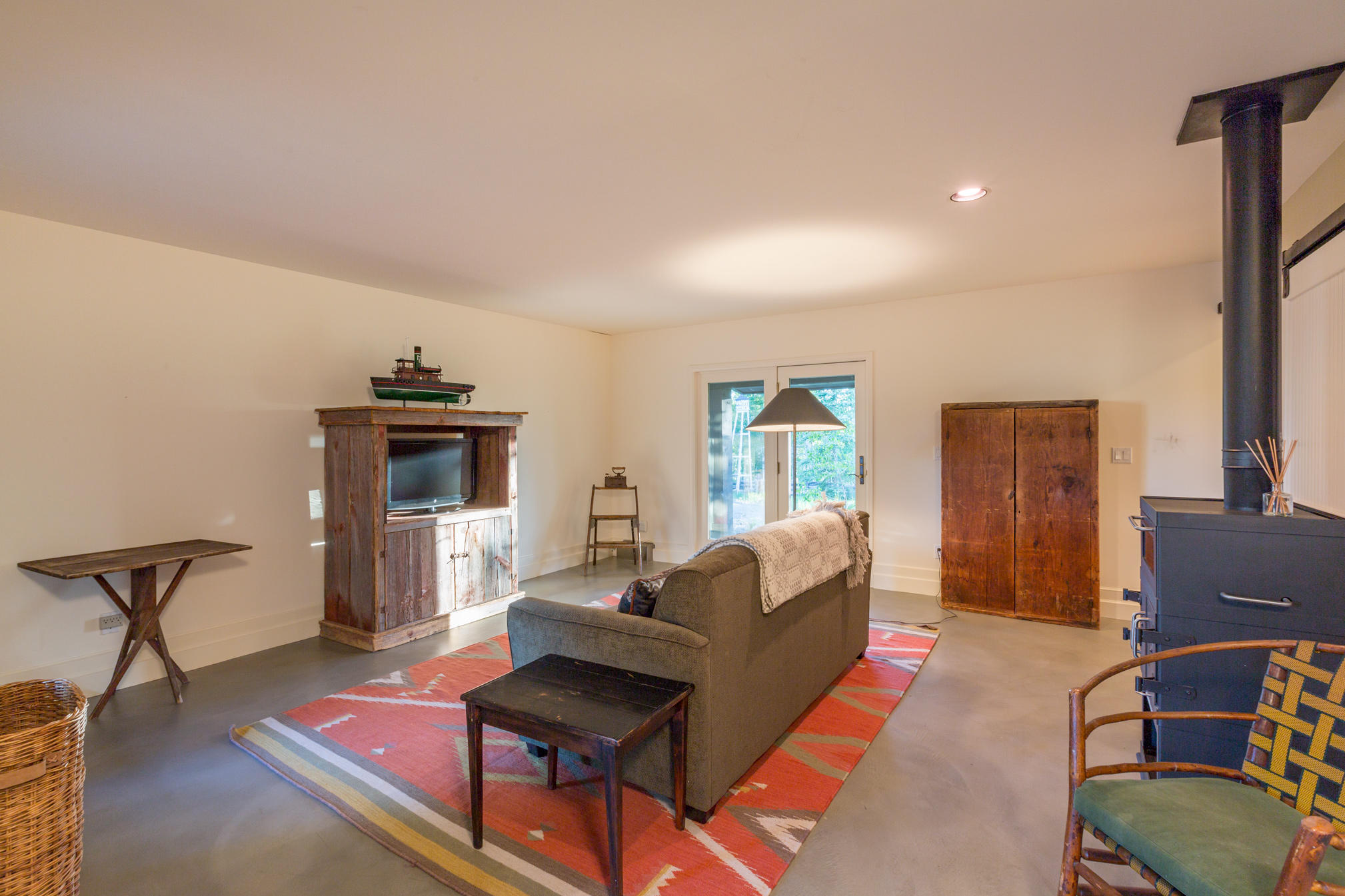 3289 Laughing Dog Road Placerville, CO 81430 - Photo 27 of 52 a living room with furniture and a window