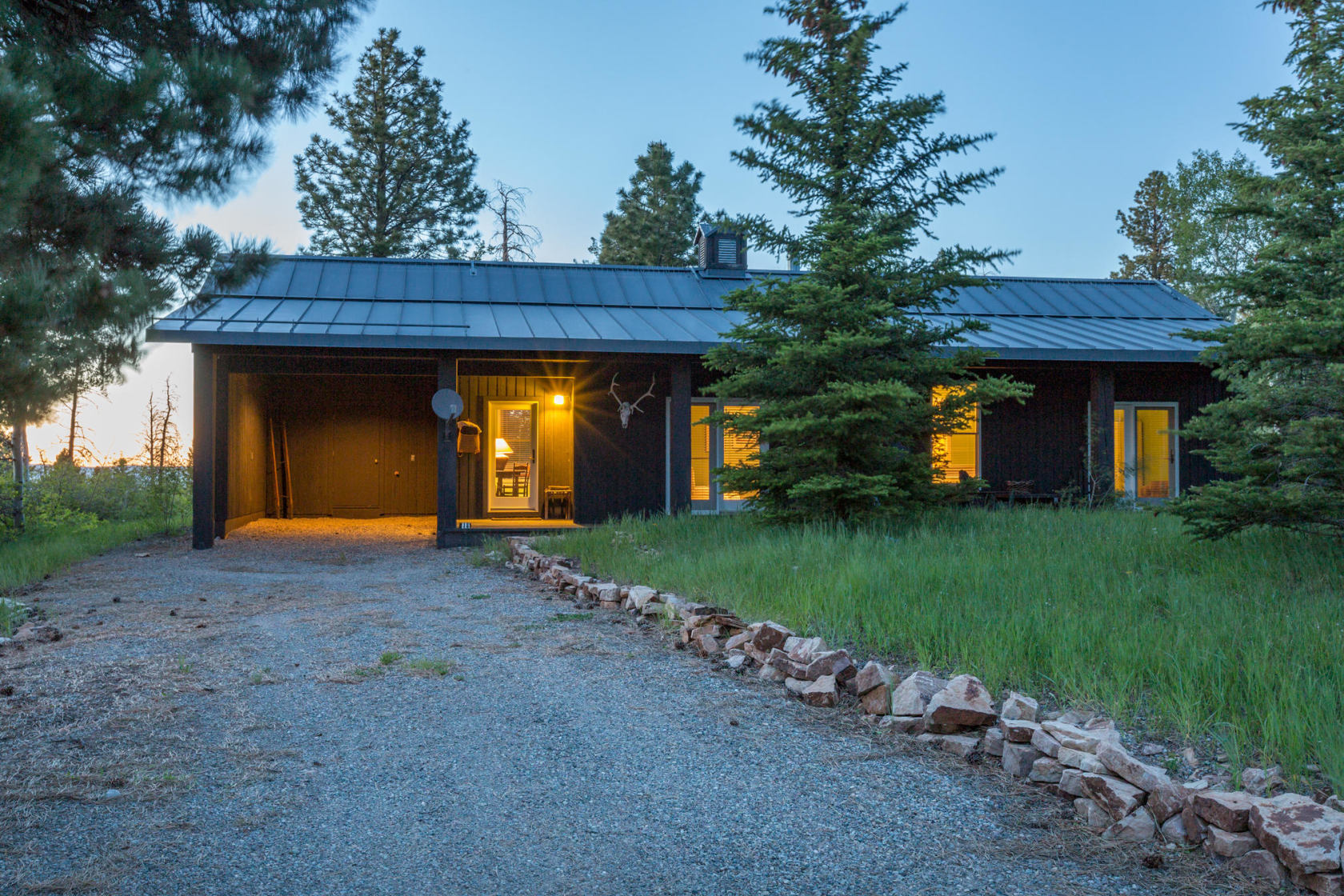 3289 Laughing Dog Road Placerville, CO 81430 - Photo 35 of 52 a view of a house with backyard and garden