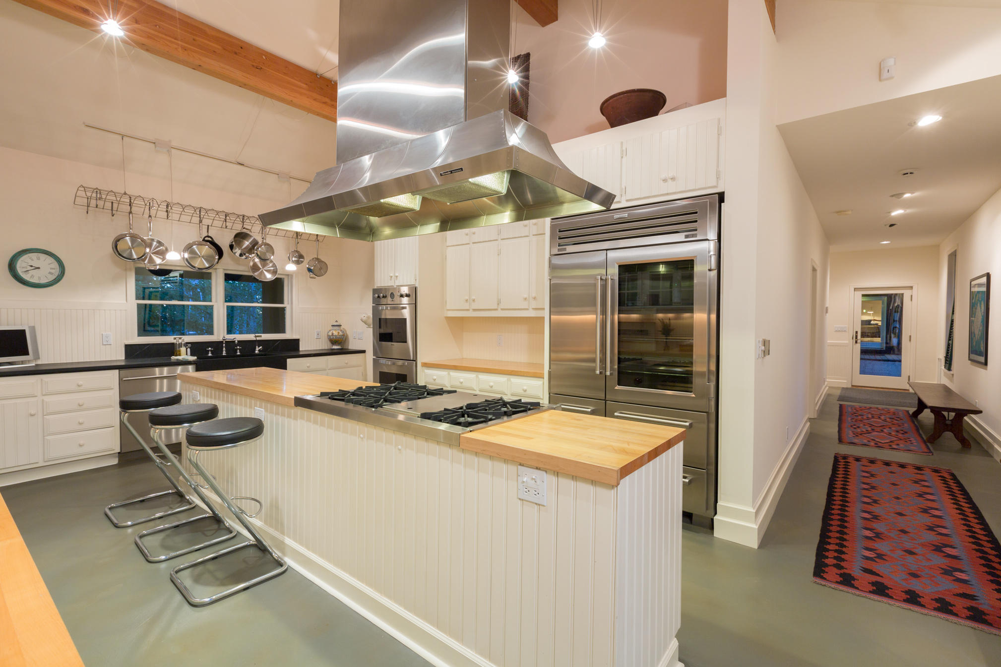 3289 Laughing Dog Road Placerville, CO 81430 - Photo 4 of 52 a room with lot of cabinets and appliances