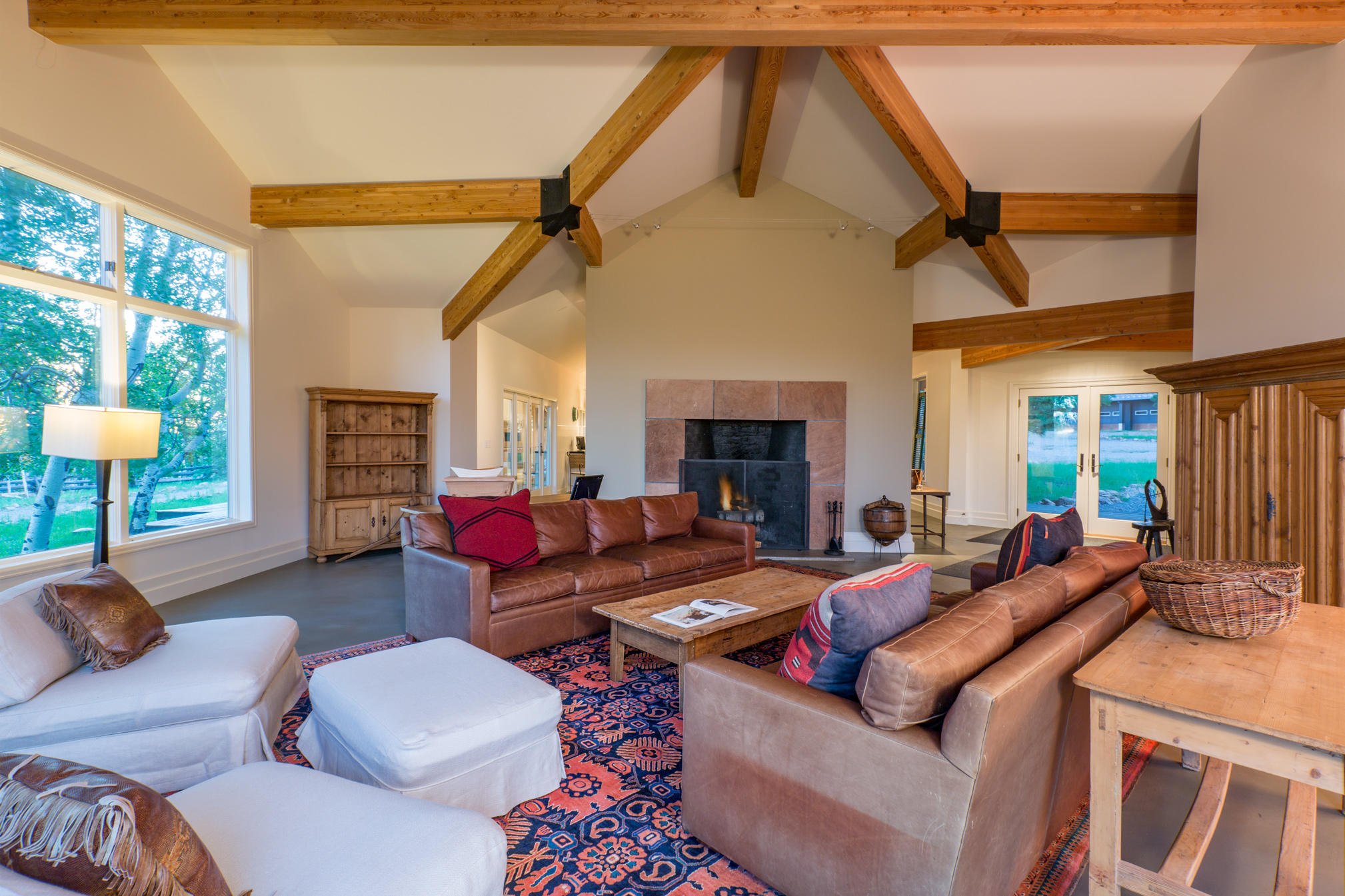 3289 Laughing Dog Road Placerville, CO 81430 - Photo 8 of 52 a living room with furniture and a fireplace