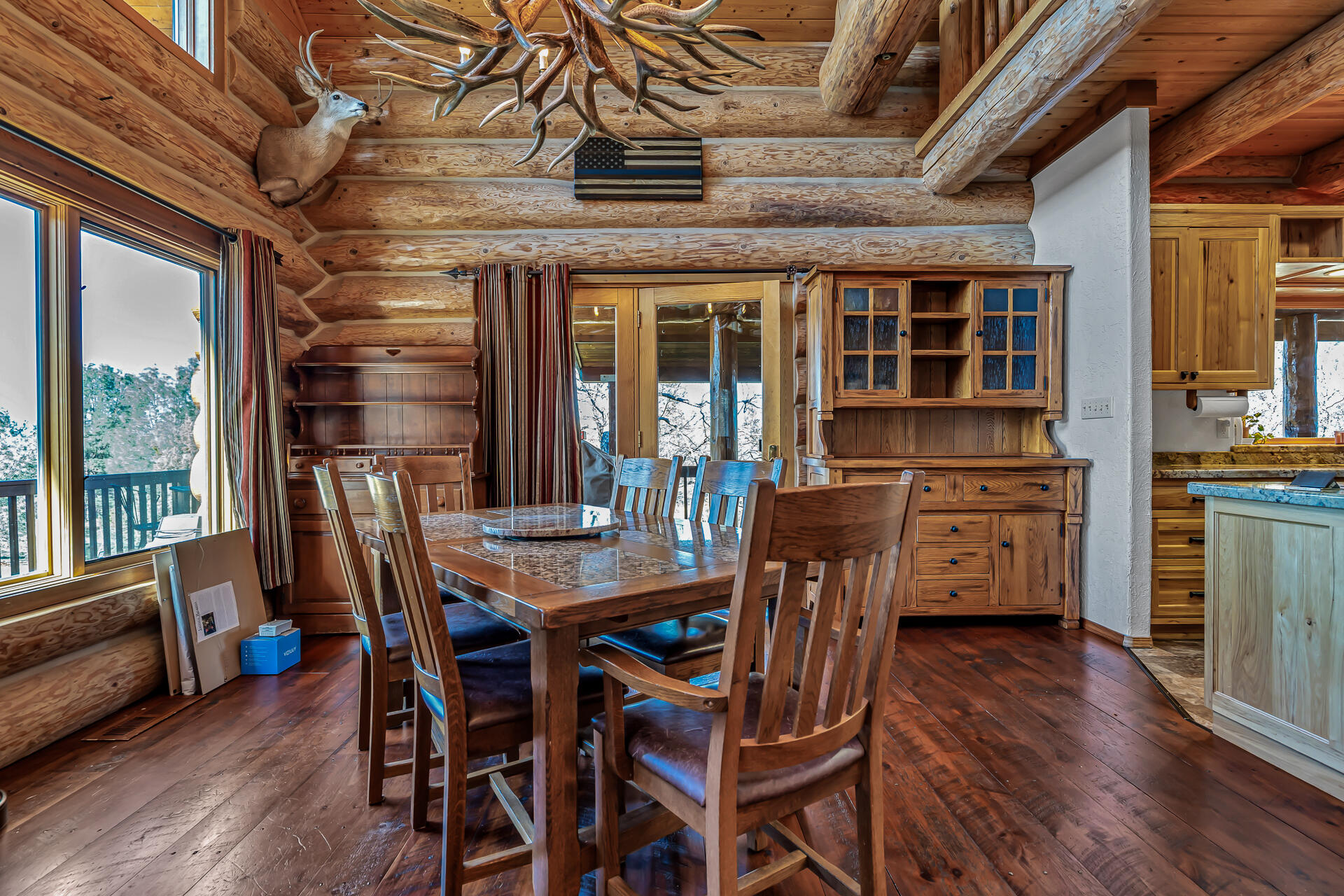 43007 Shoshoni Loop Fall River Mills, CA 96028 - Photo 29 of 87 a view of a dining room with furniture window and wooden floor