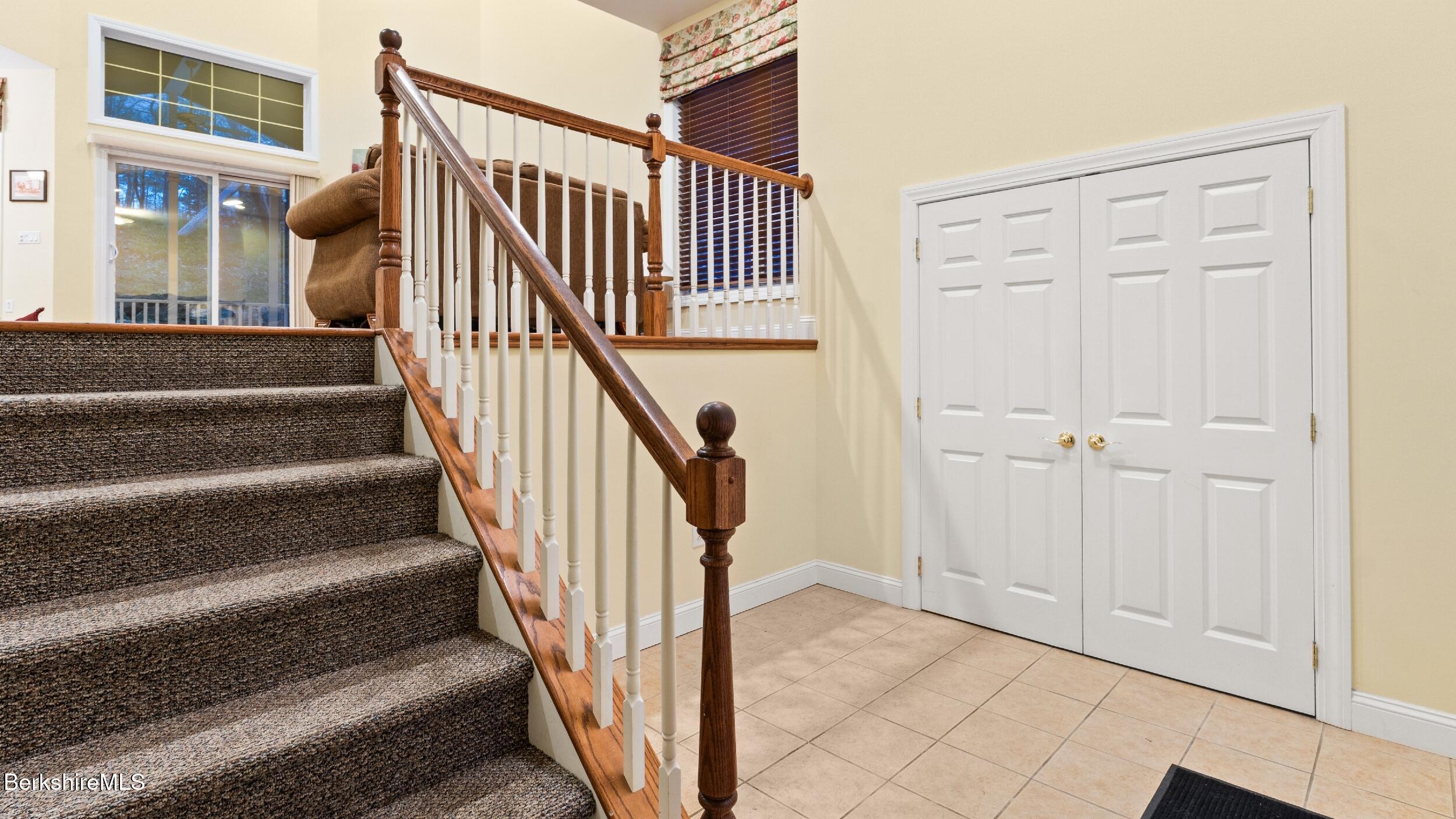 14 Alpine Trail, Unit 14 Pittsfield, MA 01201 - Photo 24 of 29 a view of a hallway with staircase