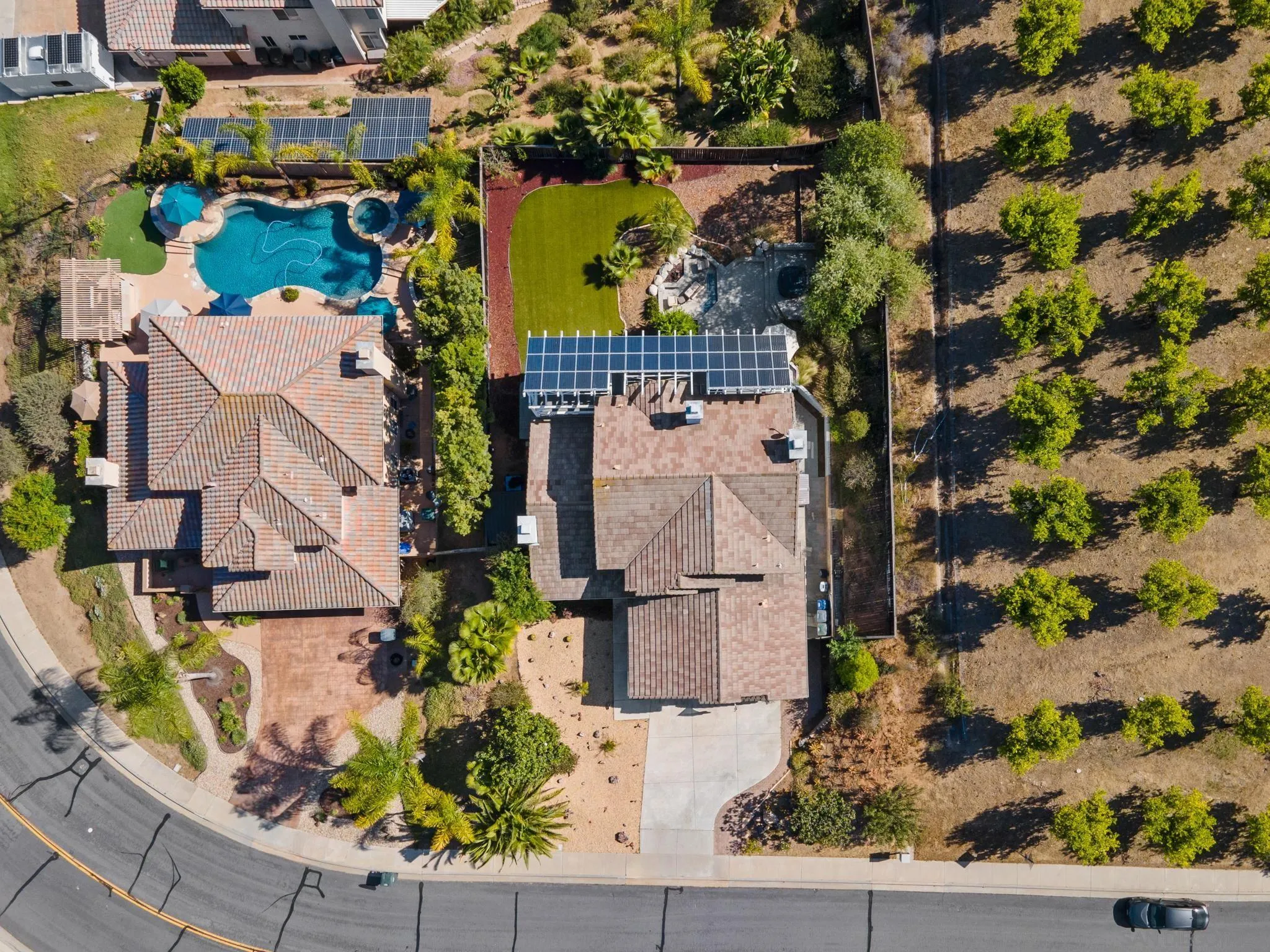 13628 Sunset View Road Poway, CA 92064 - Photo 69 of 70 an aerial view of a house with a yard and garden