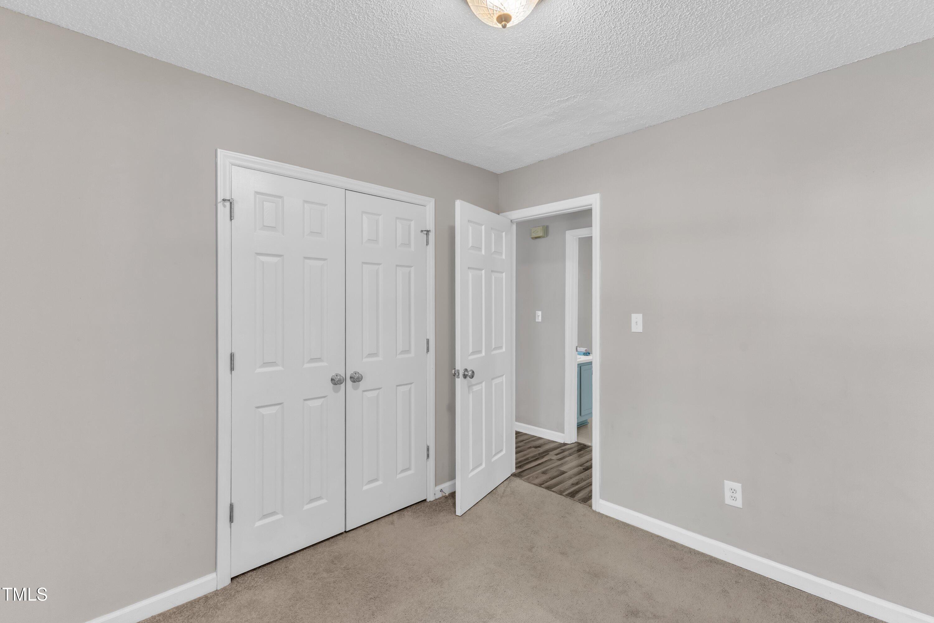 4533 Whistling Way Raleigh, NC 27616 - Photo 14 of 25 a view of an empty room