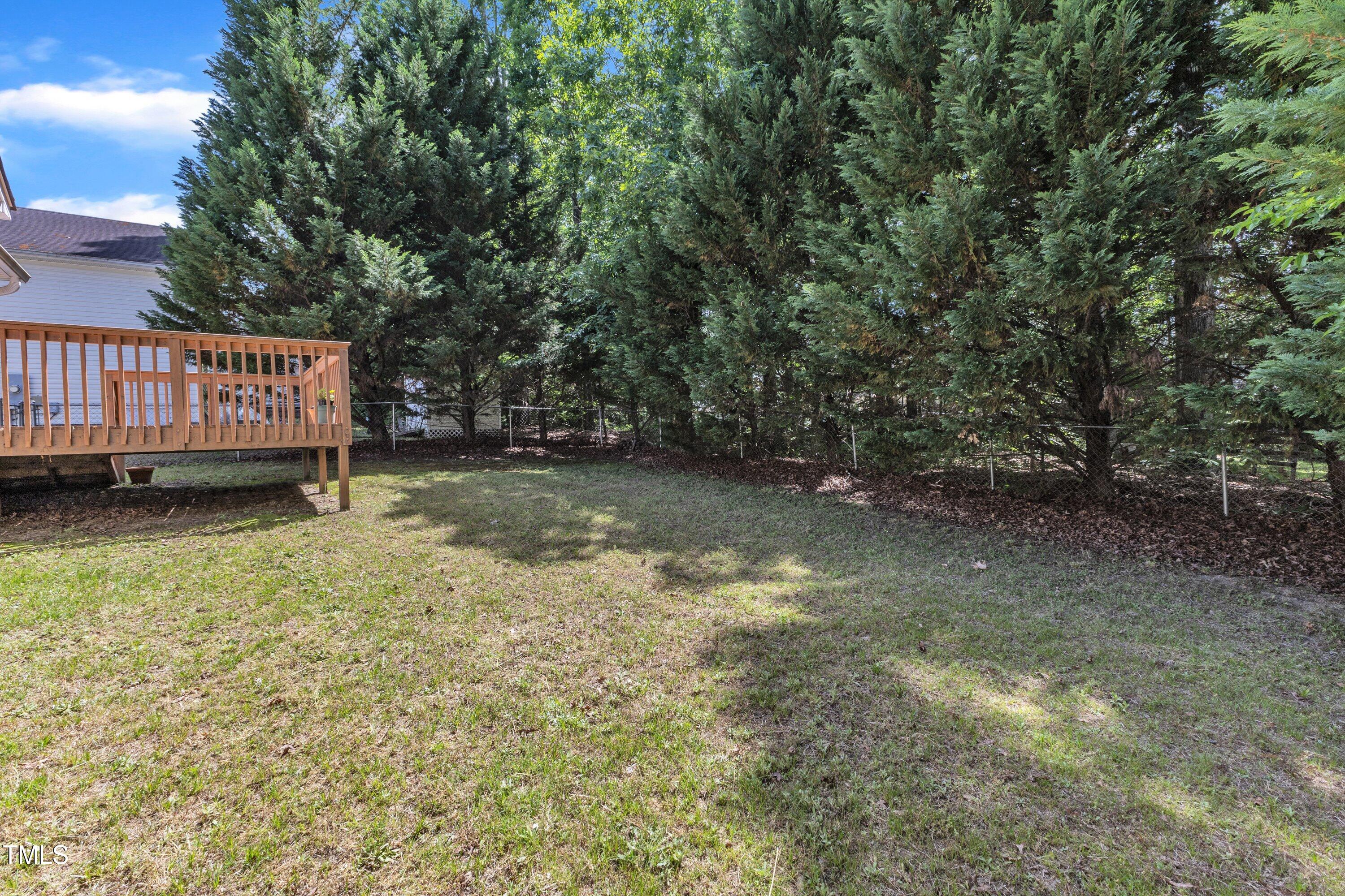 4533 Whistling Way Raleigh, NC 27616 - Photo 25 of 25 a view of a backyard with a small cabin
