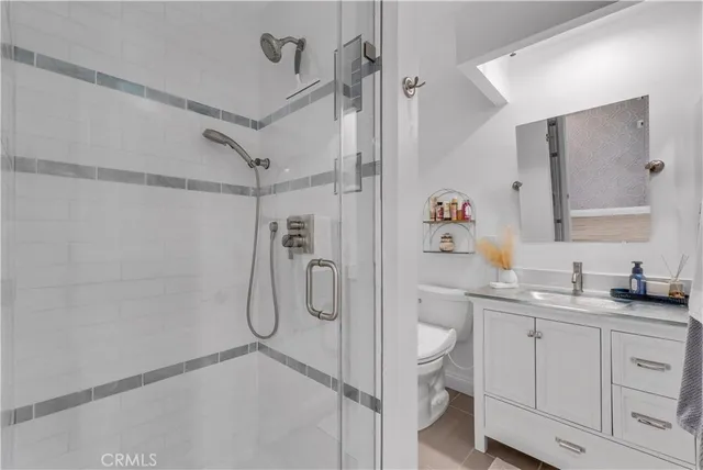 a front view of a building with outdoor seating