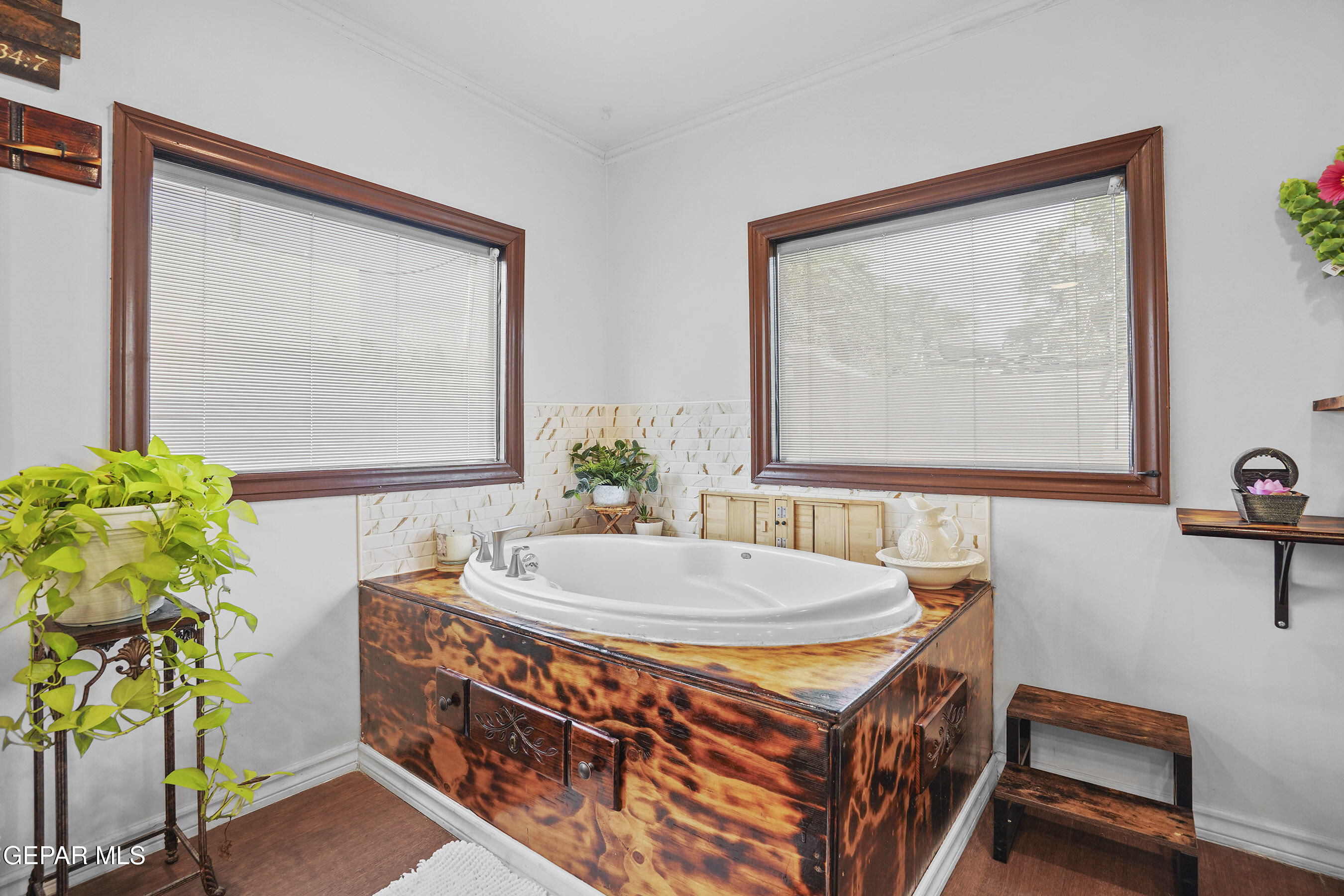 146 Croom Road El Paso, TX 79915 - Photo 9 of 54 a bathroom with a granite countertop sink a mirror and a window