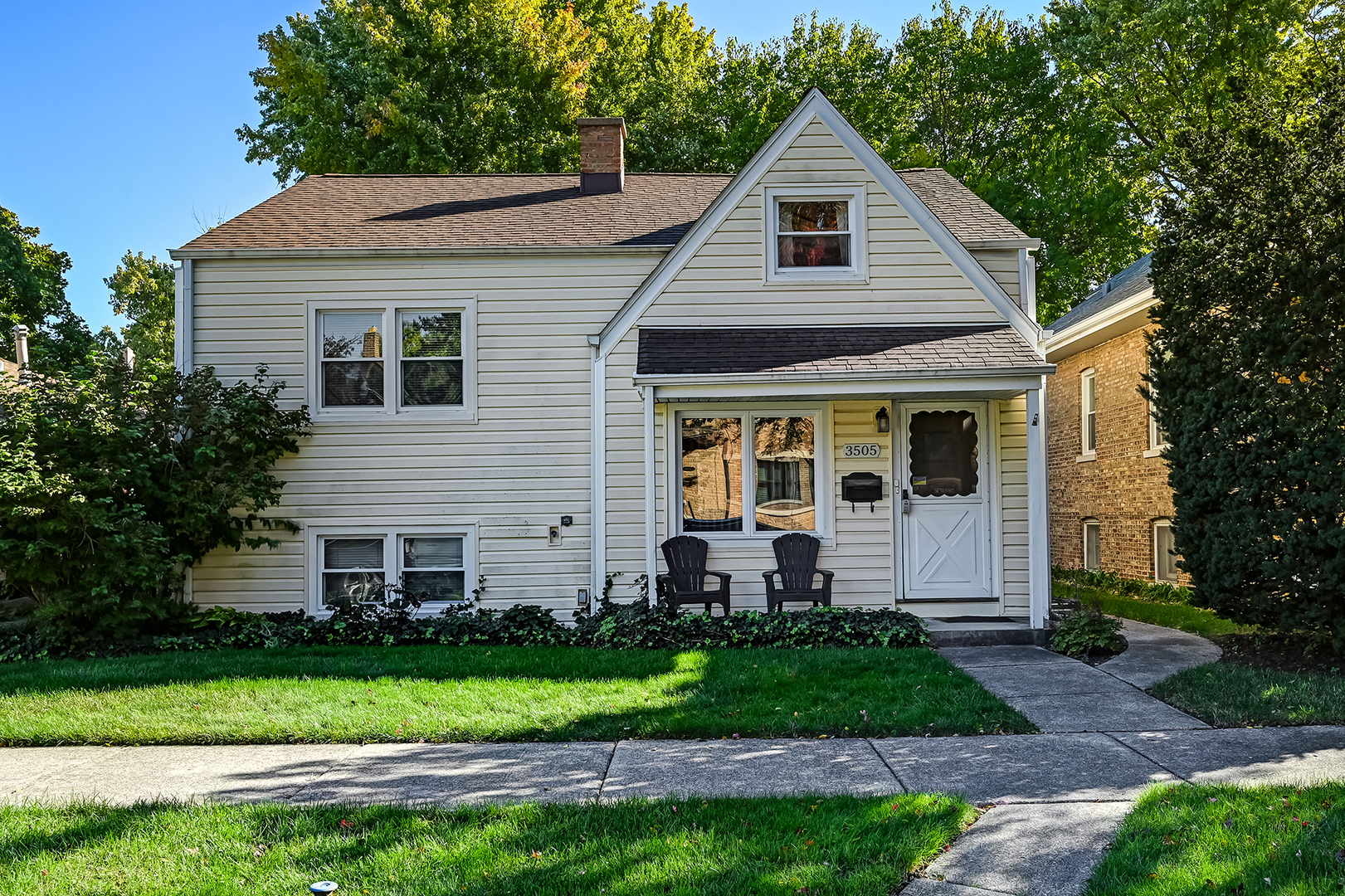 3505 Blanchan Avenue Brookfield, IL 60513 - Photo 1 of 1 a front view of a house with a yard