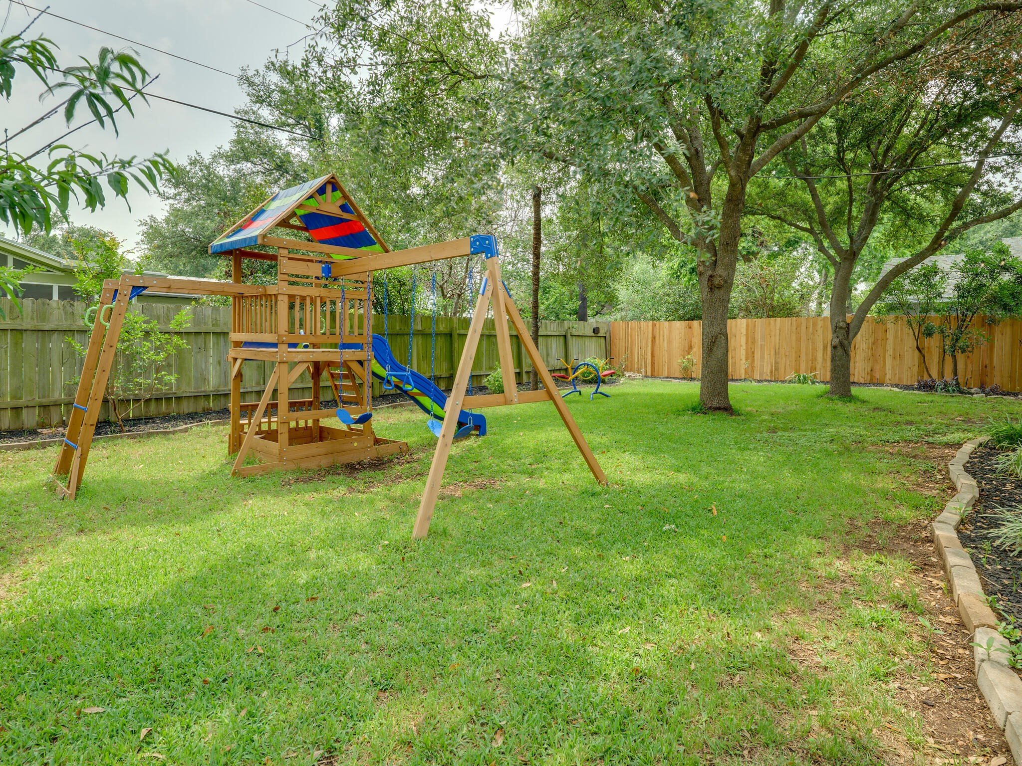 3203 Foster Lane Austin, TX 78757 - Photo 35 of 37 Alternate view of the expansive backyard.