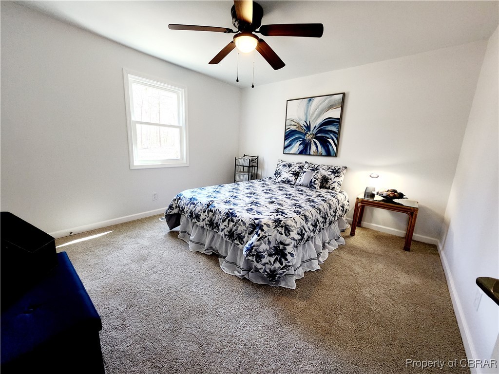 10766 Figg Shop Road Gloucester, VA 23061 - Photo 16 of 24 Bedroom #2 with carpet and ceiling fan