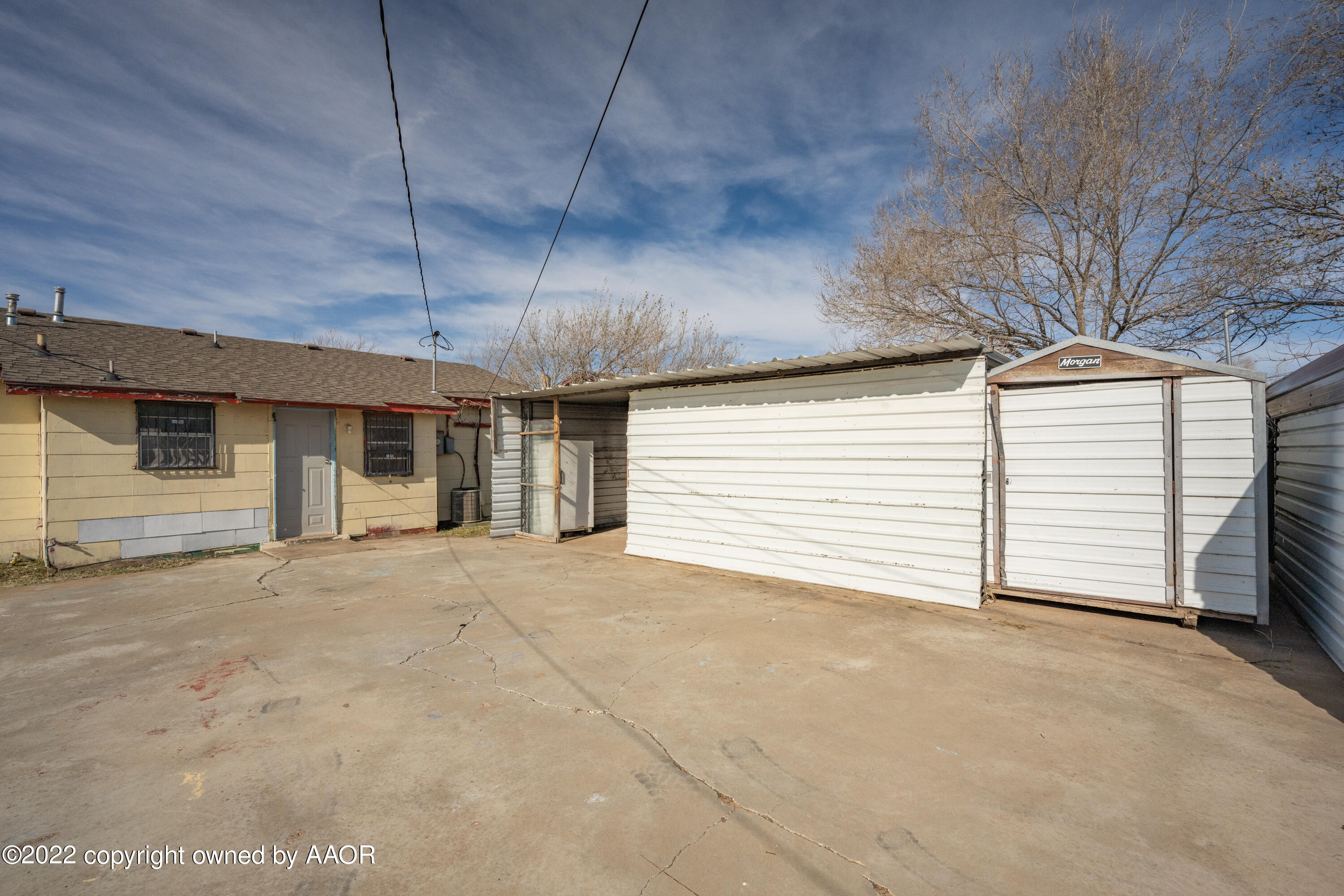 920 Heather Street Amarillo, TX 79107 - Photo 21 of 23 a view of a house with a garage