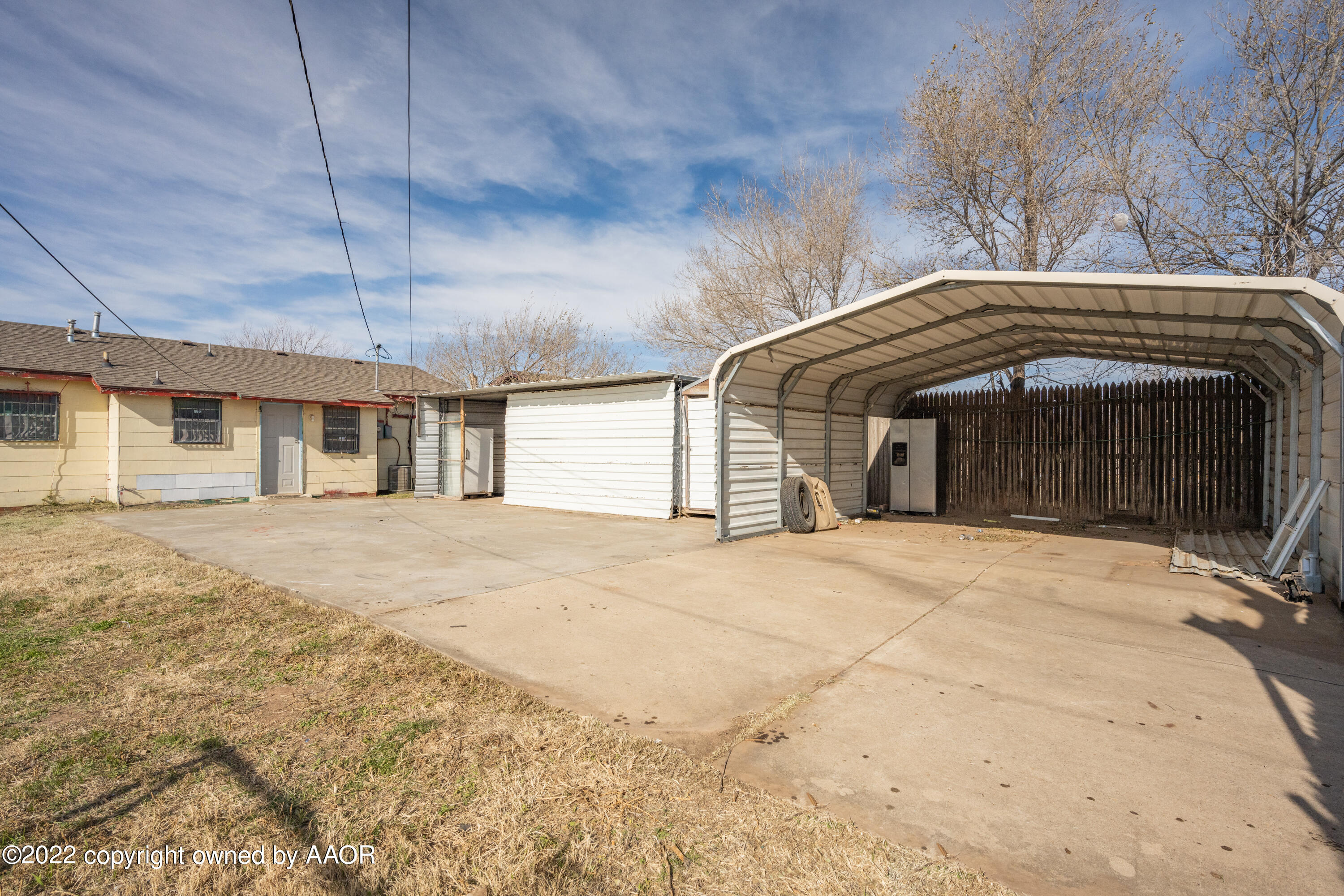 920 Heather Street Amarillo, TX 79107 - Photo 22 of 23 front view of a house with a garage