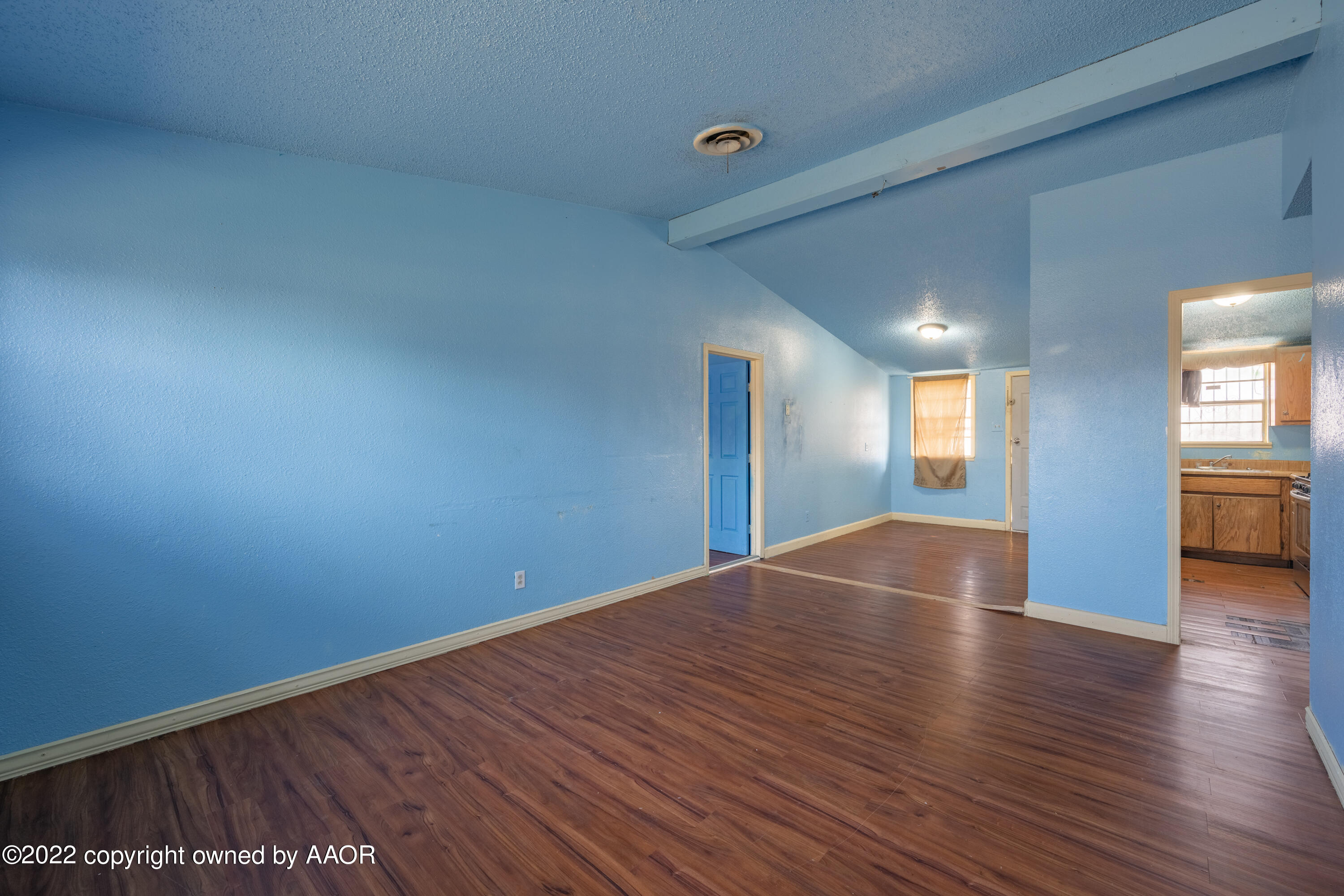 920 Heather Street Amarillo, TX 79107 - Photo 5 of 23 a view of empty room with wooden floor