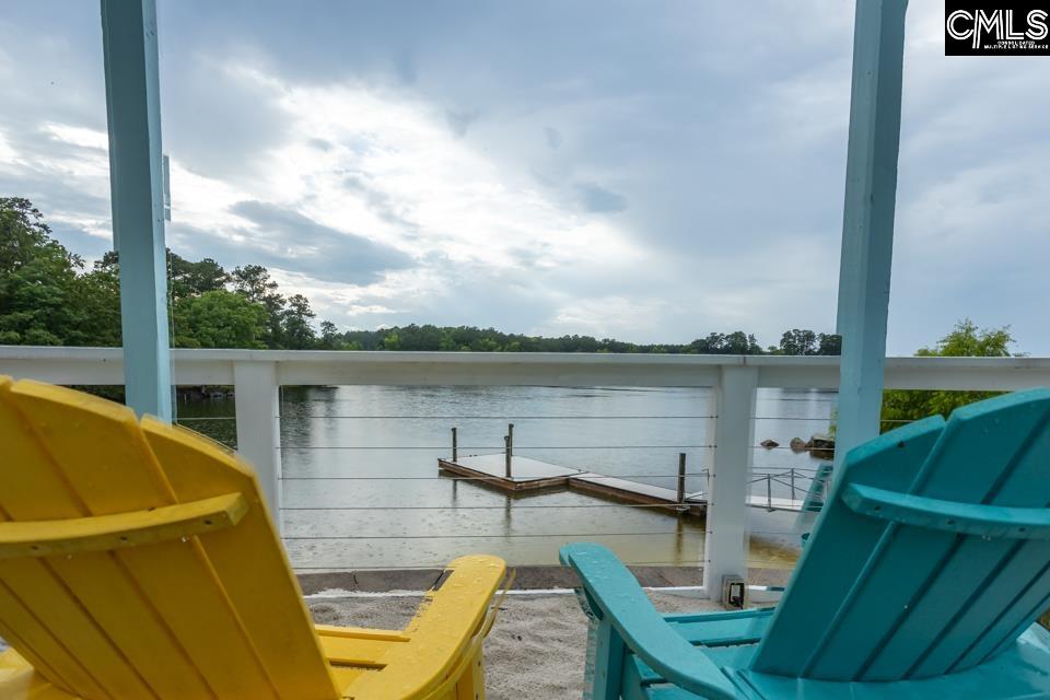 357 Cabana Way Lexington, SC 29072 - Photo 21 of 25 a view of a balcony with table and chairs