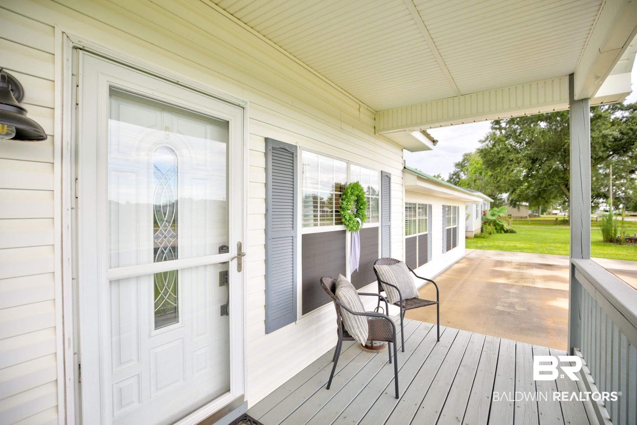 18732 Fairground Road Robertsdale, AL 36567 - Photo 6 of 46 View of wooden deck